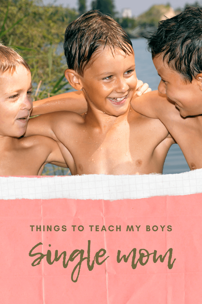 Three brothers hugging and smiling.